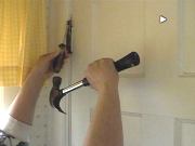 tap door hinge to remove door for cathole